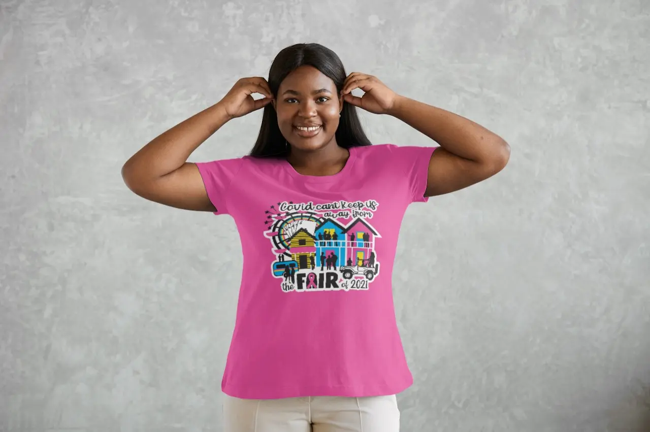 Girl with hands on her head wearing an NCF shirt